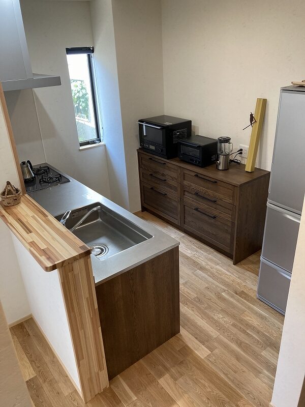 木の温もりをやさしく照らす家